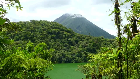 Arenal Volcano Viewed from Emerald Cerro Chato Crater Lake in Costa Rica Vídeo Stock 334679679