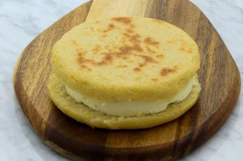 Arepa with cheese Stock Photos