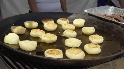Arepas in the pan. Stock Footage 51574710