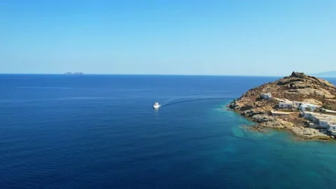 Arerial wiev drone while crossing boat in front of Kalafati beach Mykonos Stock-Footage 161085982