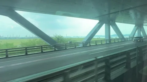 AREX Train Window View Incheon Bridge with Passing SUV 4K RAW Stock Footage 337244644