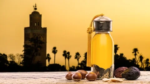 Argan oil bottle with mosque in the background Stock Footage 101180129