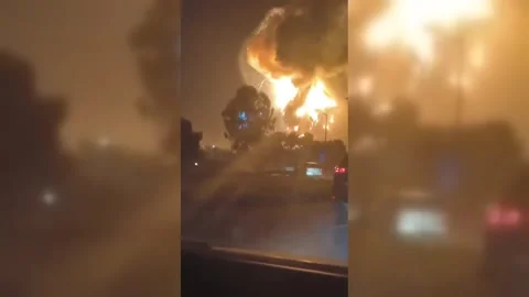Argentina: Explosions Trigger Large Blaze in Ezeiza, South of Buenos Aire... Stock Footage 321183151