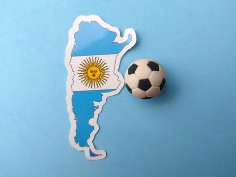 An Argentina map sticker displaying its national flag is positioned next to.. 库存照片