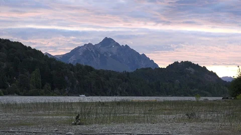 Argentina mountain rises into an evening sky Vídeos de archivo 107952272