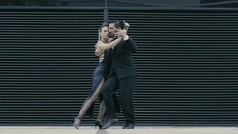 Argentine couple dancing Tango in the streets of Buenos Aires Argentina Stock Footage 188846591