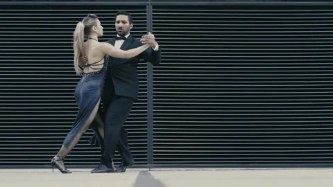 Argentine couple dancing Tango in the streets of Buenos Aires Argentina Stock Footage 188846672