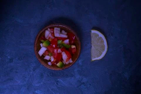 Argentinian salsa criolla with a lemon Stock Photos