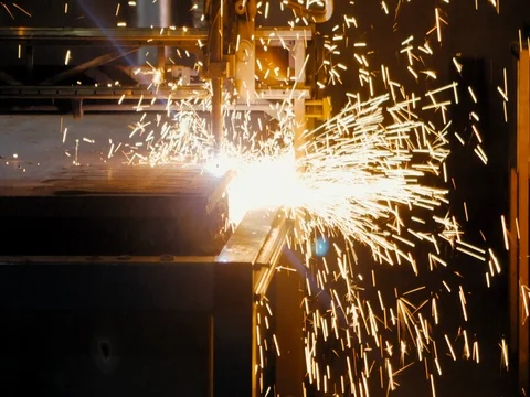 ARGON WELDING. A blacksmith or welder, with his welder, welding steel and iron Stock Footage 77933920
