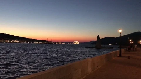 Argostoli at sunset by Devosetou bridge on the lagoon in Kefalonia in Greece. Stock-Footage 81327532