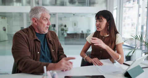 Argument, documents and finance with business people in office for conflict or Stock Footage 320461873