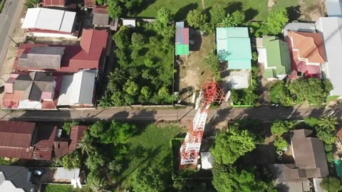Arial down-tilted fly-by of Celphone-tower Stock Footage 155950250