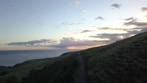 Arial drone flight over Hawaii following a car Video stock 166637780