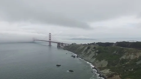 Arial Drone Forward Push of Golden Gate Bridge on Foggy Day Stock Footage 84038707
