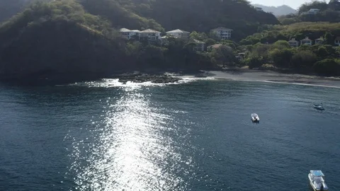 Arial drone pan across gorgeous vacation tropical paradise Видео 103343659