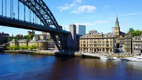 Arial footage of the Tyne bridge and Newcastle skyline in Newcastle Upon Stock Footage