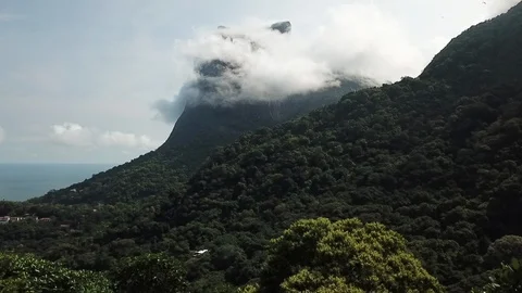 ARIAL OF MOUNTAIN CLOUDS AND BRAZILIAN RAINFOREST Stock Footage