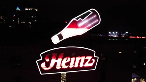 Arial Orbit Around Iconic Heinz Neon Sign at Night in Pittsburgh Pennsylvania Stock Footage 341363307