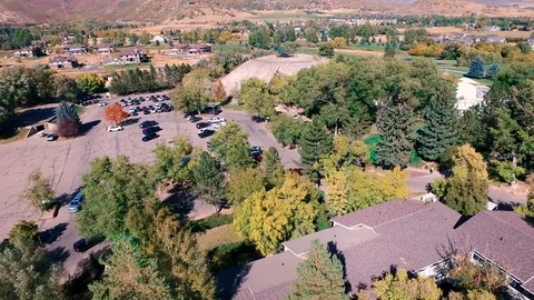 Arial pan right to left homstead entrance Stock Footage 105344992