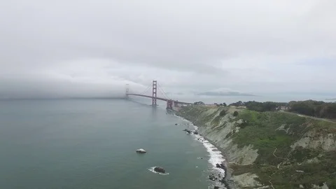 Arial  Push Back of Golden Gate Bridge on Foggy Day Stock Footage 84038663