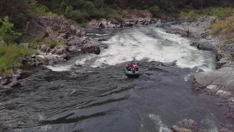Arial of a raft going through rapids 1 Video stock 103731853