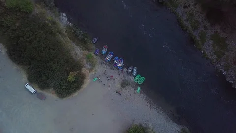 Arial of rafts entering a river Stock Footage 103749151