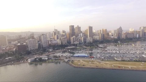 Arial shot of Durban harbour and city sky scrapers Stock Footage