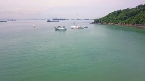 Arial shot flying over boats in the tropics. Видео 80608048