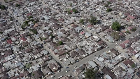 Arial shot half tilt down of Alexandra, a township in Johannesburg,  South Stock Footage 158287283