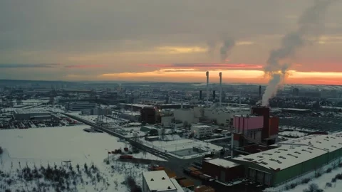 Arial Shot of an Industrial Complex with the Sun Setting in the Background Stock Footage 159480031