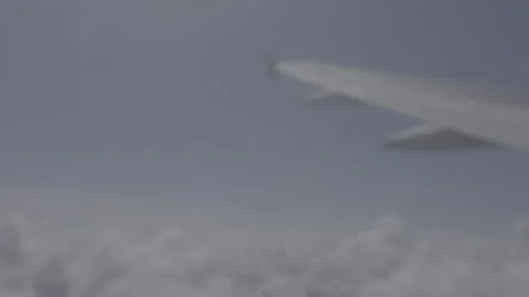 Arial Shot of the Inside Airplane Flying Over Florida with Clouds Stock-Footage 285554733