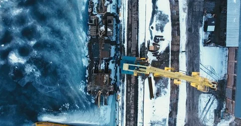 Arial shot, loading cranes in port in winter Stock Footage 71667855