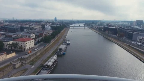 Arial shot over the river, with a modern bridge Stock Footage 85434268