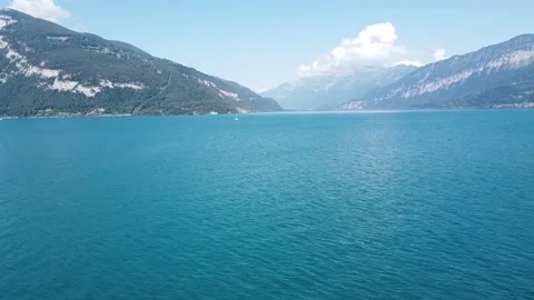 Arial Shot Reverse shot over lake and Alps Stock Footage 201882957