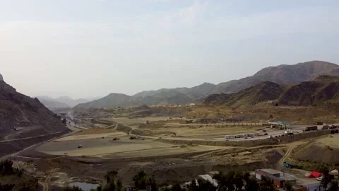 Arial shot of Tor Kham border crossing at Afghan border in Pakistan Stock Footage 199270863