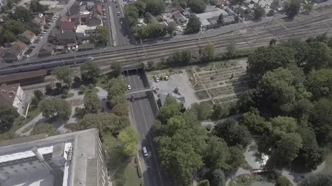Arial Shot of Train on Tracks in City 库存影片 83263364