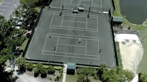Arial of tennis players in action Stock Footage 103284196