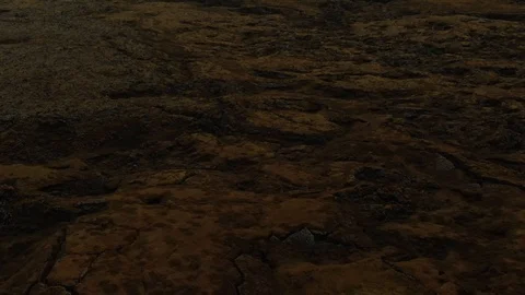 Arial tilt up view from lava rocks revealing a volcanic mountain in West Iceland Video stock 115712582