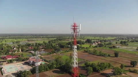 Arial vertical pan &amp; tilt of Celphone-tower Stock Footage 155950258