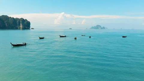 Arial view of blue ocean with longtail boats at Ao Nang Beach, Krabi, Thailand Video stock 150460169