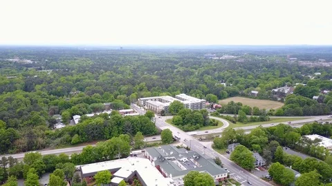 Arial View of Building Among Trees Stock Footage 99517382