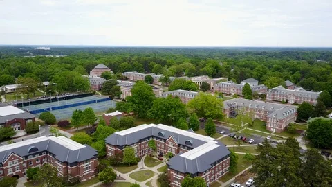 Arial View of Building Among Trees Stock Footage 99517881