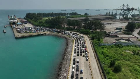 ARIAL VIEW OF CAR JAM BEFORE ENTER THE SHIP IN MERAK Stock Footage 239393591