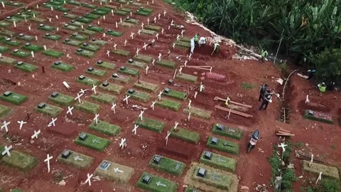 ARIAL VIEW OF COVID 19 CEMENTERY AT BAMBU APUS JAKARTA, INDONESIA. Stock Footage 165408296