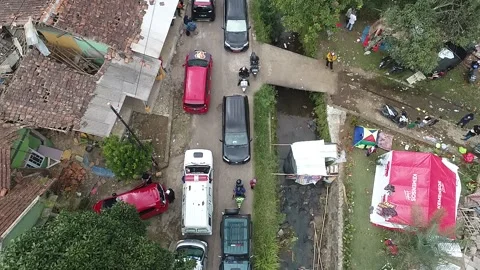 ARIAL VIEW OF EARTQUAKE DISASTER AT GASOL VILLAGE, CIGANJUR Stock Footage 235560183