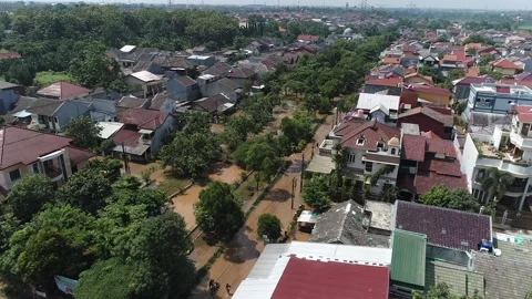 ARIAL VIEW OF FLOOD AT BUMI NASIO INDAH HOUSING AREA AT TANGERANG, INDONESIA Stock Footage 164528606
