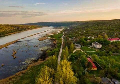 Arial view over the river and small village. Stock-Fotos