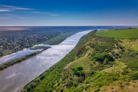 Arial view over the river and small village. Dniester river. Stock Photos
