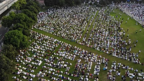 ARIAL VIEW OF PEOPLE READY TO PRAYING AT AL AZHAR MOSQUE IN SOUTH JAKARTA Stock Footage 154129139