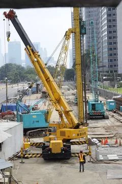 Arial view of people working in construction for mass transportation Stock Photos
